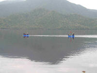 Kayakers leaving Cavern Camp